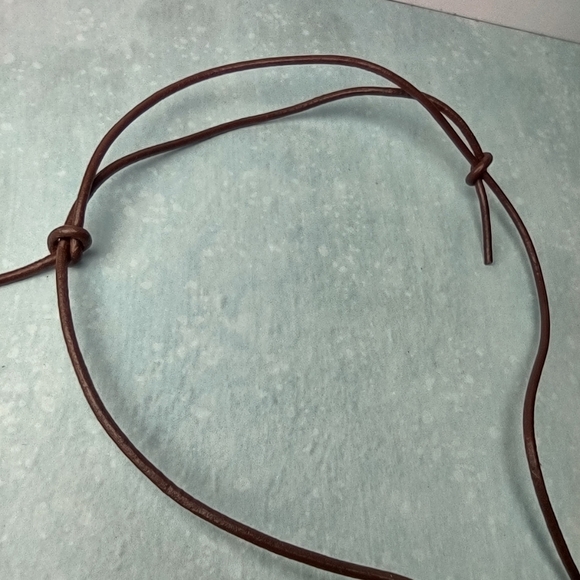 👍 5 for $20 Simple Carved Stone Round Pendant Necklace on Brown Adjustable Cord - Picture 4 of 5